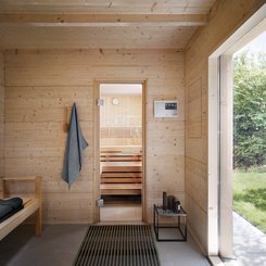 TALO outdoor sauna: Anteroom with panoramic window and view into the sauna.