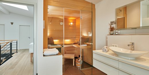 KLAFS AURA sauna in a bathroom