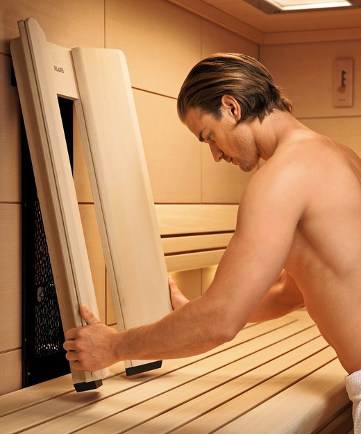 Adjustable infrared sauna backrest