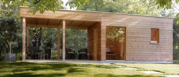 A garden sauna surrounded by natural ambience